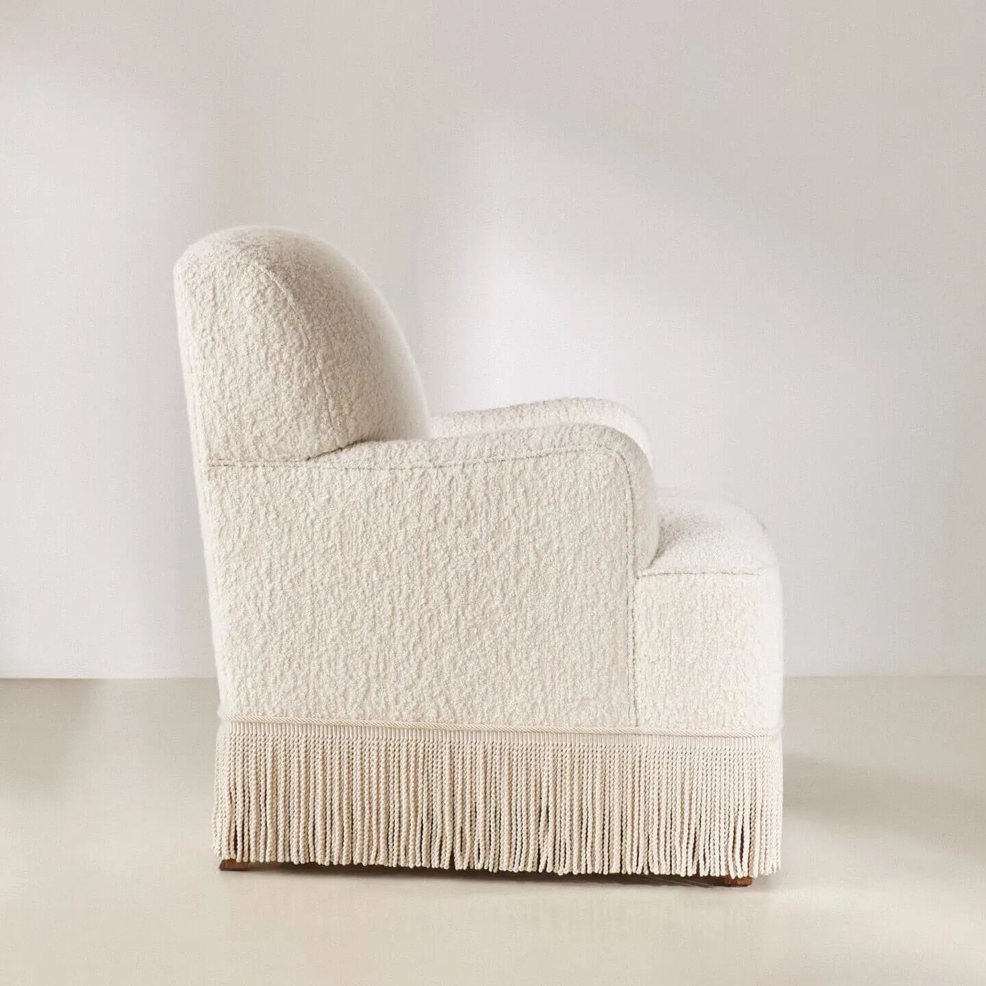 Cream Boucle Fringe Chair with Sculpted Arms for Boutique Corners Secondary image
