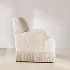 Cream Boucle Fringe Chair with Sculpted Arms for Boutique Corners