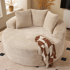 Cream Corduroy Round Sofa with Enveloping Curves for Cozy Lounging