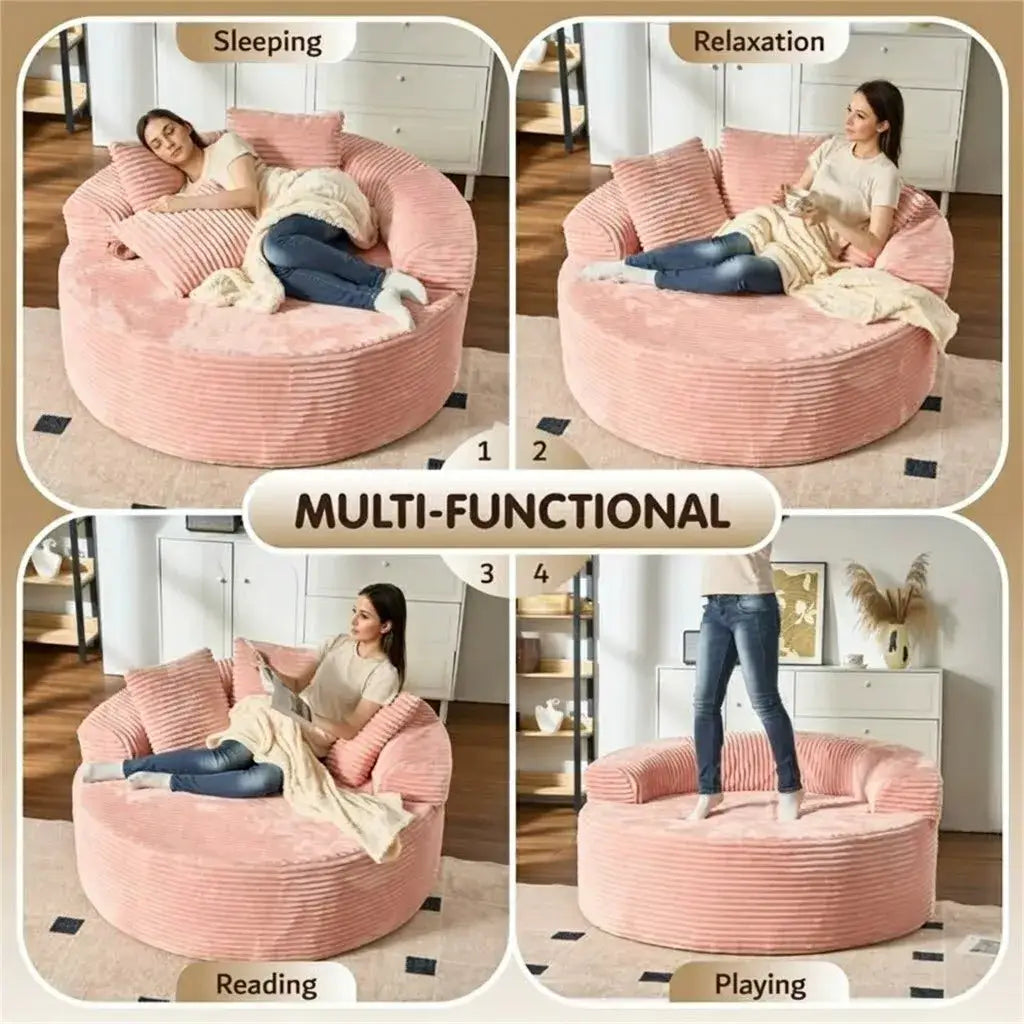 Cream Corduroy Round Sofa with Enveloping Curves for Cozy Lounging