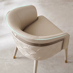 Curved Arm Leather Dining Chair Series with Lacquered Legs and Tailored Trim