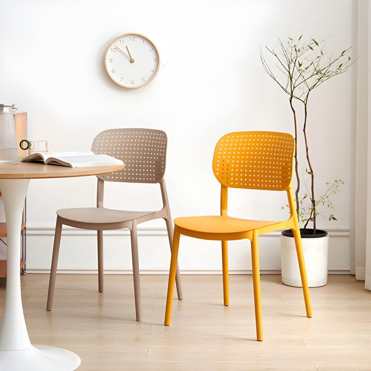 Stackable Scandinavian style plastic and acrylic side chair with low back for dining