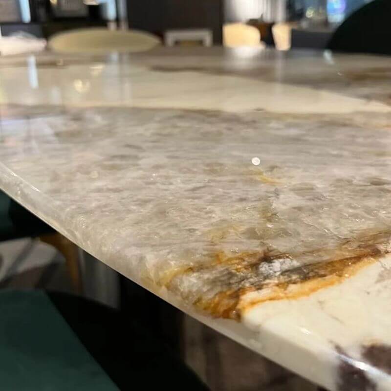 Oval marble top dining table seating 6-8 with multicolor finish