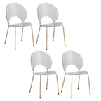 Stackable acrylic dining chair with open back and metal legs, armless design for modern dining rooms