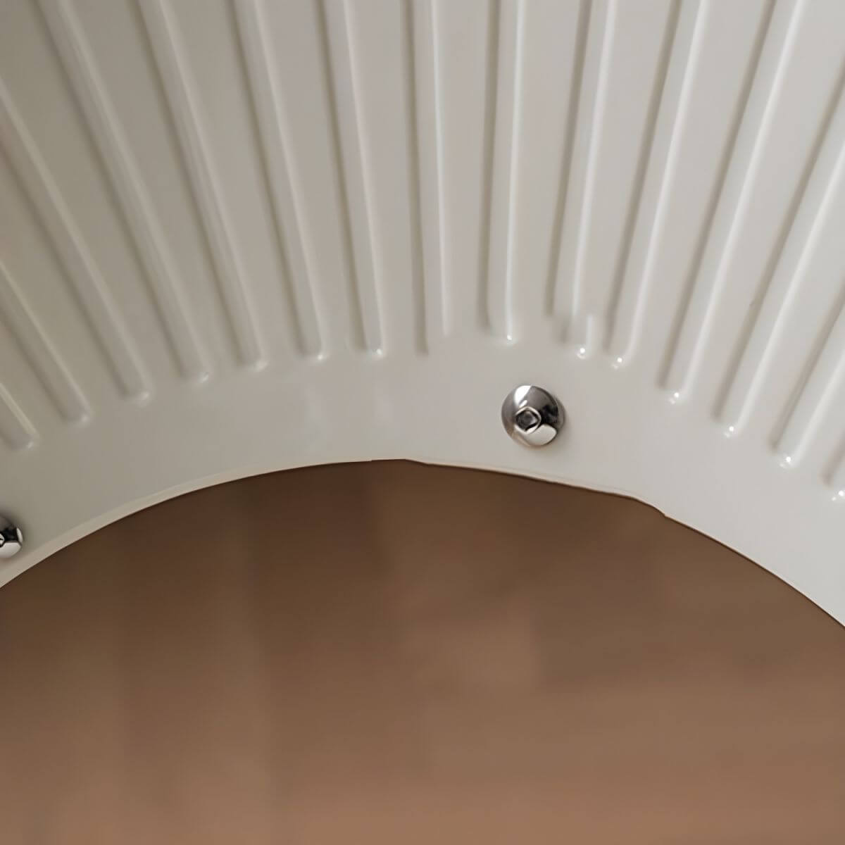 Stackable Scandinavian style dining chair with plastic seat, acrylic back, and silver legs