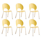 Stackable Scandinavian style dining chair with plastic seat, acrylic back, and silver legs