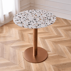 Modern marble table with sturdy metal base, perfect for adding a timeless aesthetic to any space
