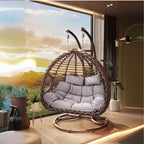 Porch swing with tropical ivory and auburn hydrophobic framed pads, metal stand and chain included