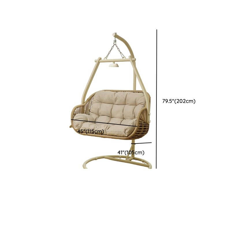 Tropical cocoa and cream upholstered porch swing with alloy frame, stand, and chain included