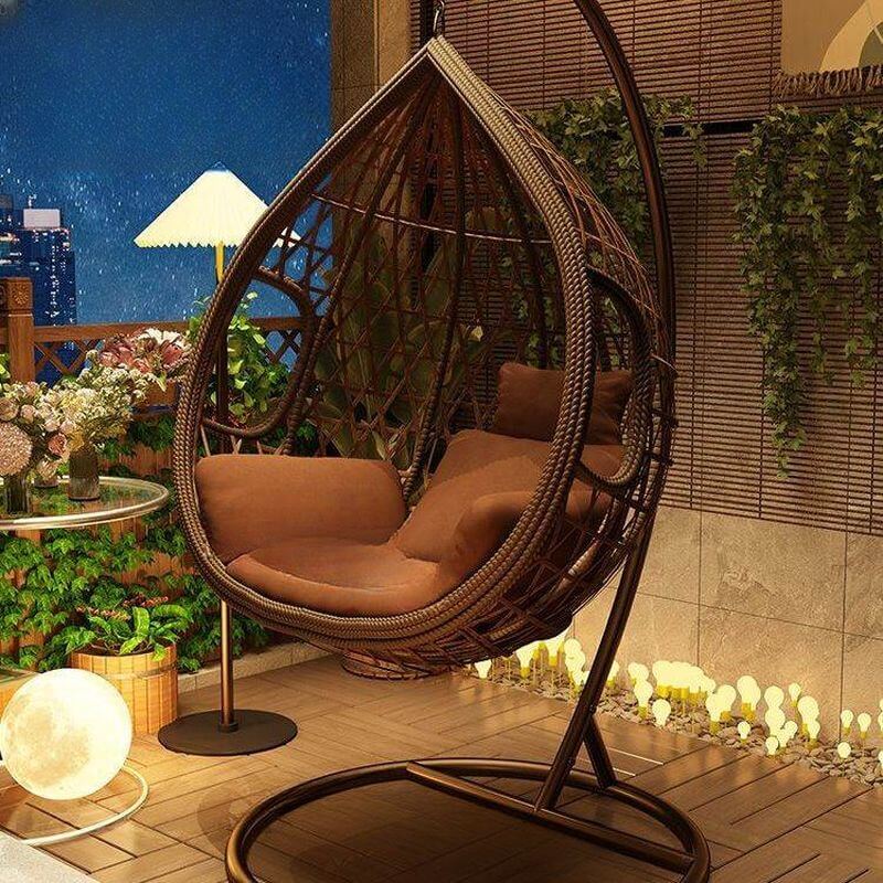 Auburn tropical alloy porch swing with stand, cushions, and chain for outdoor comfort