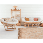 Cozy natural rattan papasan chair available in single or double size for comfortable lounging