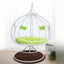 Two-seater metal porch swing egg chair with stand, cushions, and chain included