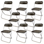 Contemporary acrylic folding armless chair with open back, ideal for dining rooms