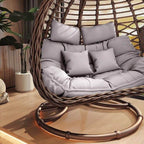 Porch swing with tropical ivory and auburn hydrophobic framed pads, metal stand and chain included
