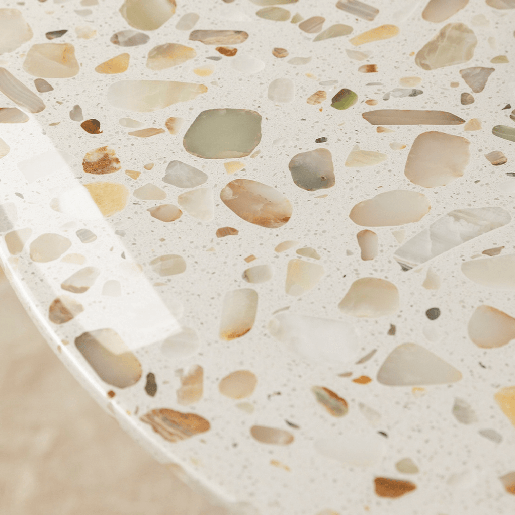 Modern terrazzo dining table with sleek design, perfect for cozy meals and home office use