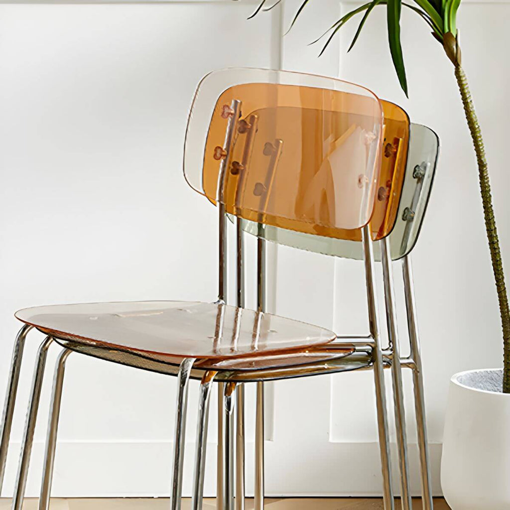 Transparent acrylic dining chair with modern design, perfect for living room and kitchen seating