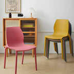 Stackable modern Scandinavian plastic and acrylic chair for kitchen and dining use