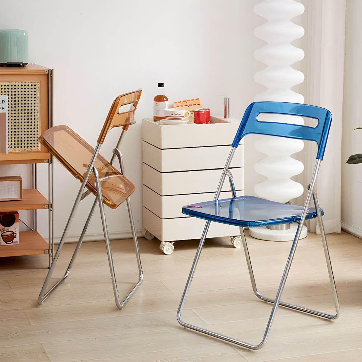 Modern collapsible open back side chair made of plastic and acrylic, ideal for kitchen and dining areas