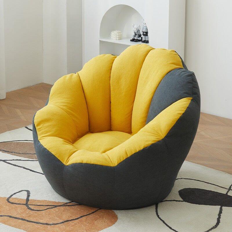Lemon color cotton blend Papasan chair with slipcover and sewn pillow back accent