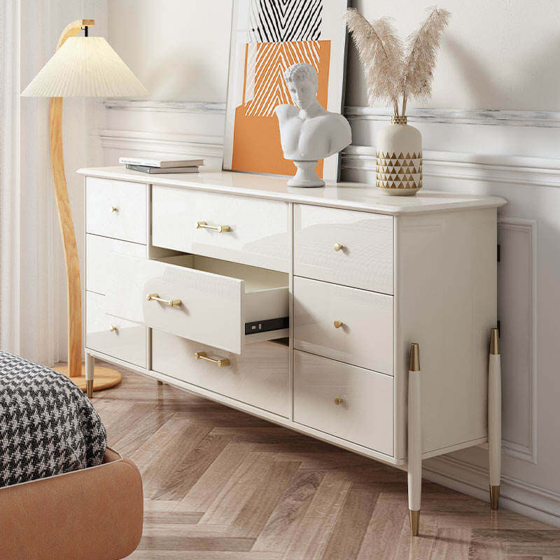 Beige storage cabinet featuring multiple drawers for organized home storage