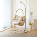 Tropical cocoa and cream upholstered porch swing with alloy frame, stand, and chain included