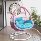 Tropical porch swing with corrosion-resistant cushions, alloy chain, and sturdy stand included
