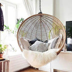 Climate-resistant metal porch swing with cushions, chain, and stand in unfinished color