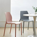 Stackable modern Scandinavian plastic and acrylic chair for kitchen and dining use