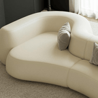 Double-Sided Curved Sofa in Cream Leather with Sculptural Silhouette