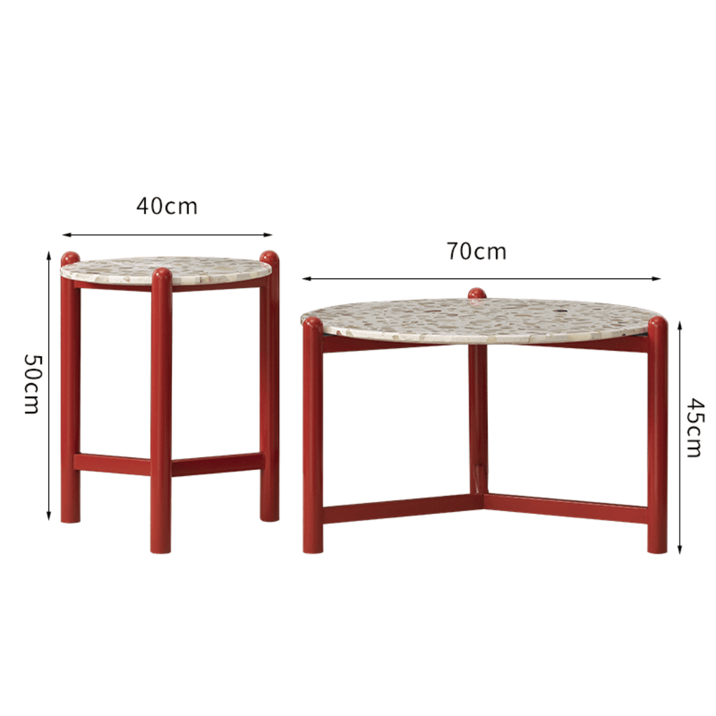 Round side table with vibrant red terrazzo top, featuring a modern minimalist design