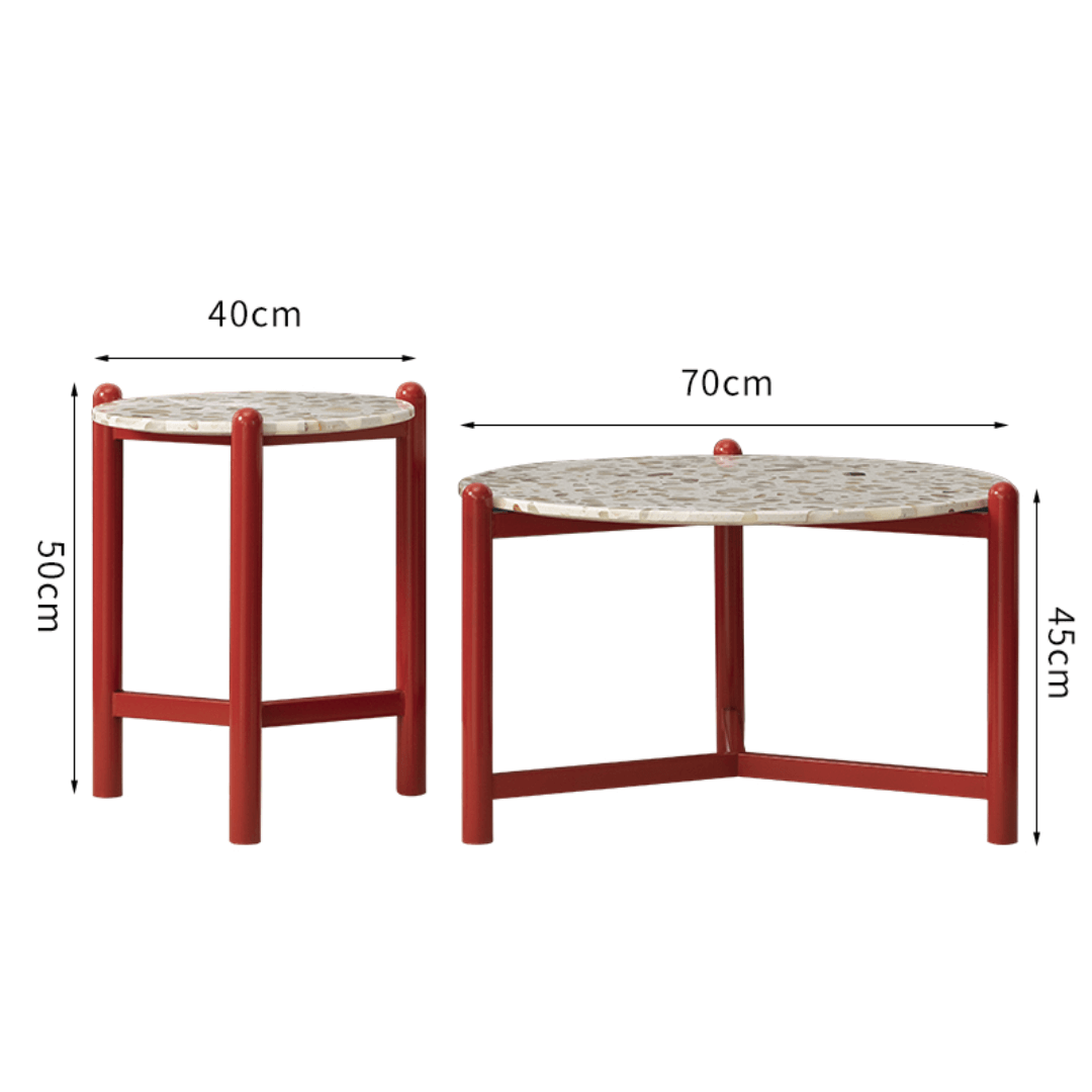 Round side table with vibrant red terrazzo top, featuring a modern minimalist design