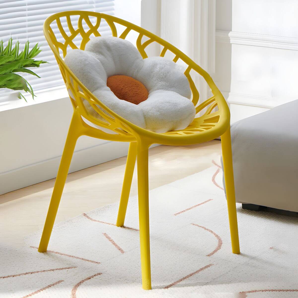 Scandinavian style sloped arm chair made of plastic and acrylic, ideal for kitchen and dining areas