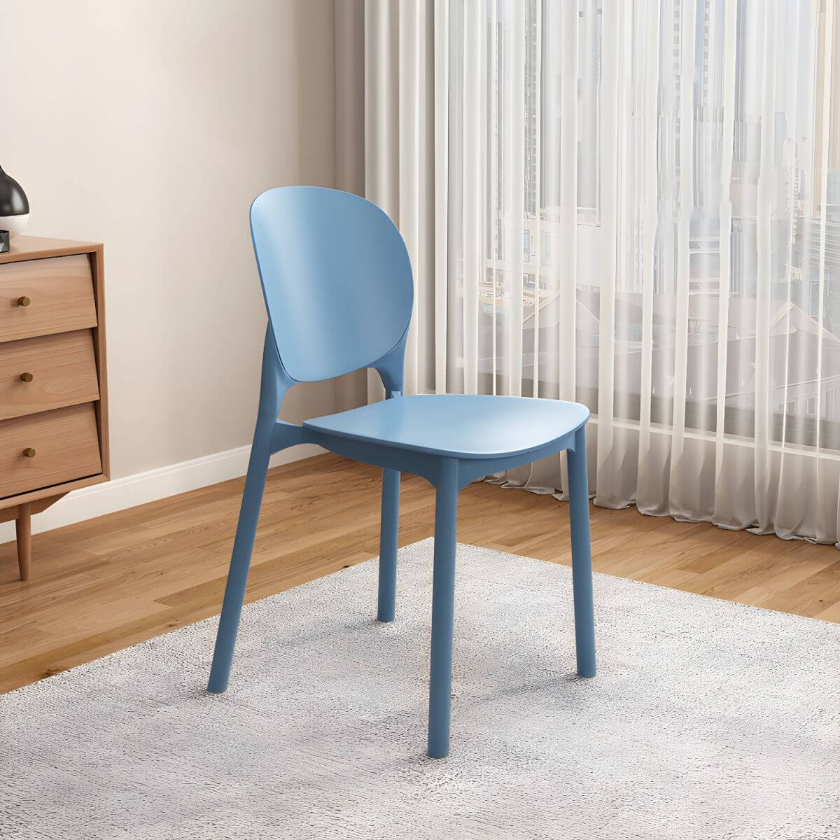 Stackable Scandinavian side chair with open back made of plastic and acrylic for dining