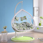 Metal porch swing with cushions, chain, and stand, designed to be heat resistant for outdoor use