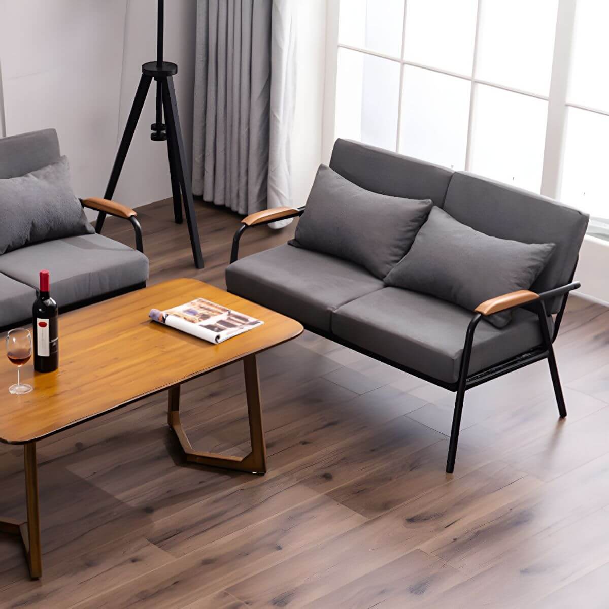 Mid century modern 2-seater sofa with black metal frame and solid wood arms