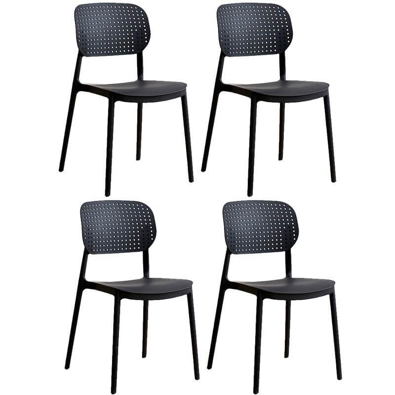 Stackable Scandinavian style plastic and acrylic side chair with low back for dining