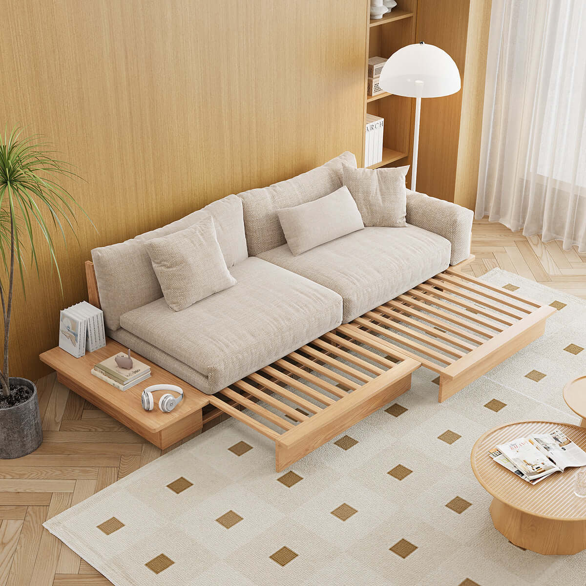 Modern pull-out floor sofa bed with reversible armrests and lift-top storage for space-saving comfort