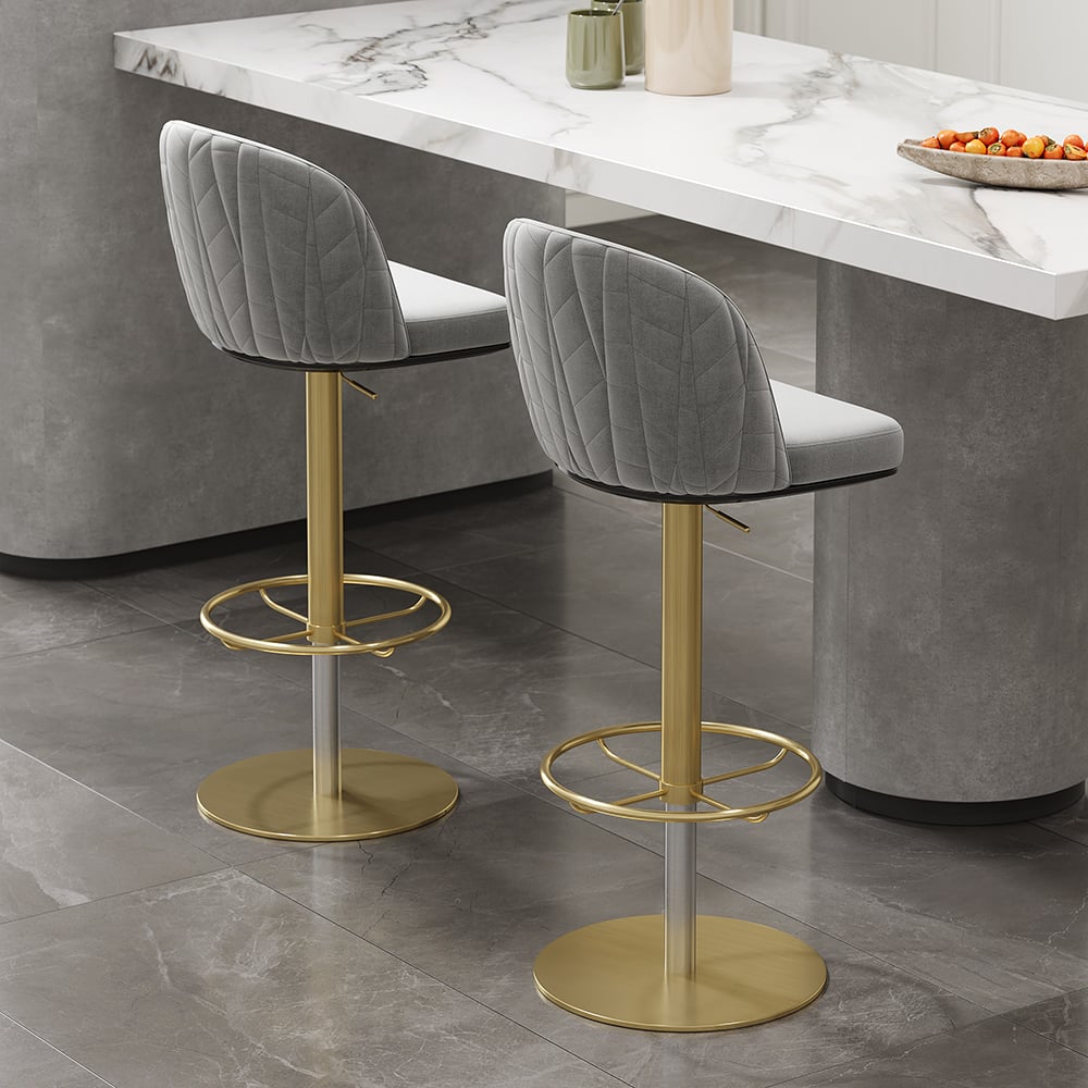 Gray velvet swivel bar stool with curved back and adjustable height, perfect for kitchen or bar seating