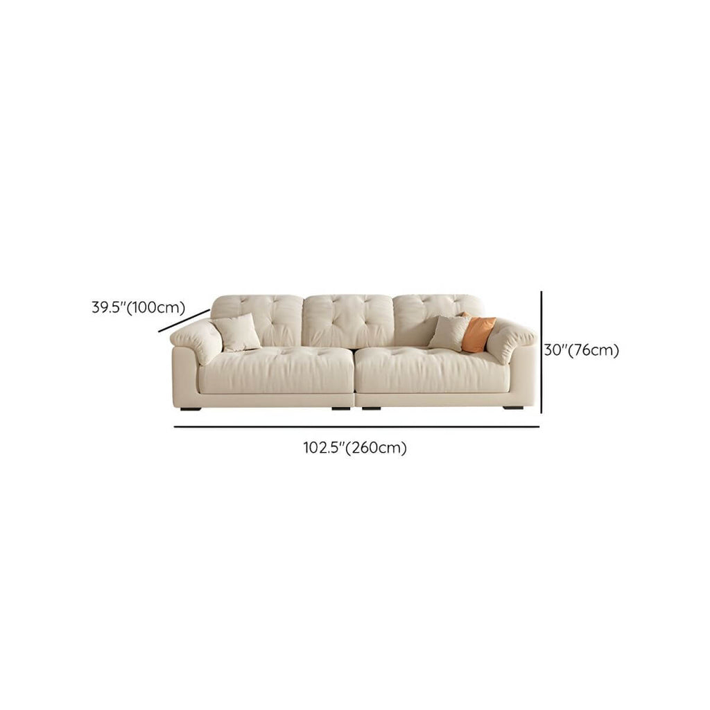 Beige polyester blend sofa with tufted back and pillow top arms, modern and comfortable seating