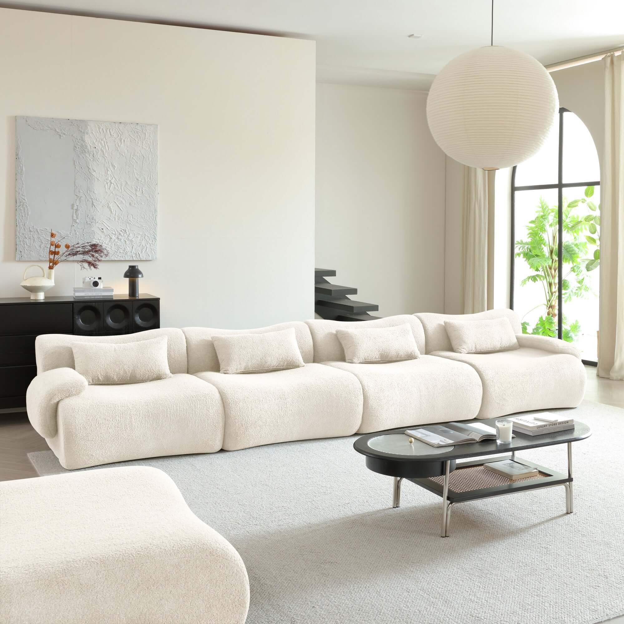 Modern sectional sofa upholstered in soft teddy velvet fabric with modular design