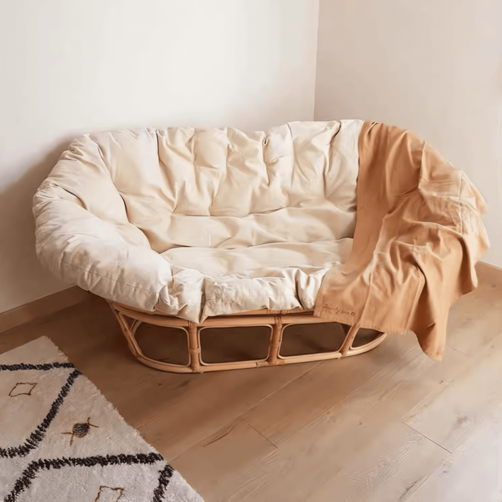 Cozy natural rattan papasan chair available in single or double size for comfortable lounging