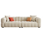 Beige upholstered wood sofa with square arms and sewn pillow back for modern living rooms