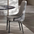 Oval dining table with black marble top and trestle metal base, modern dining room set