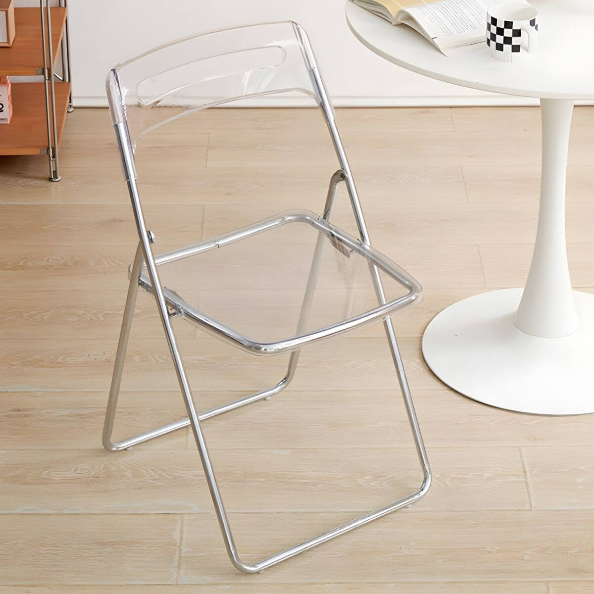 Modern collapsible open back side chair made of plastic and acrylic, ideal for kitchen and dining areas