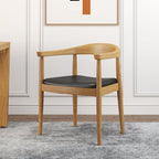 Set of four modern curved back dining chairs with walnut wooden frame and upholstered leather seats main product image