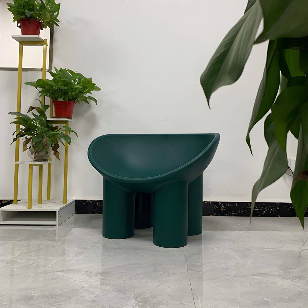 Modern armless papasan accent chair with bowl shape and elephant legs