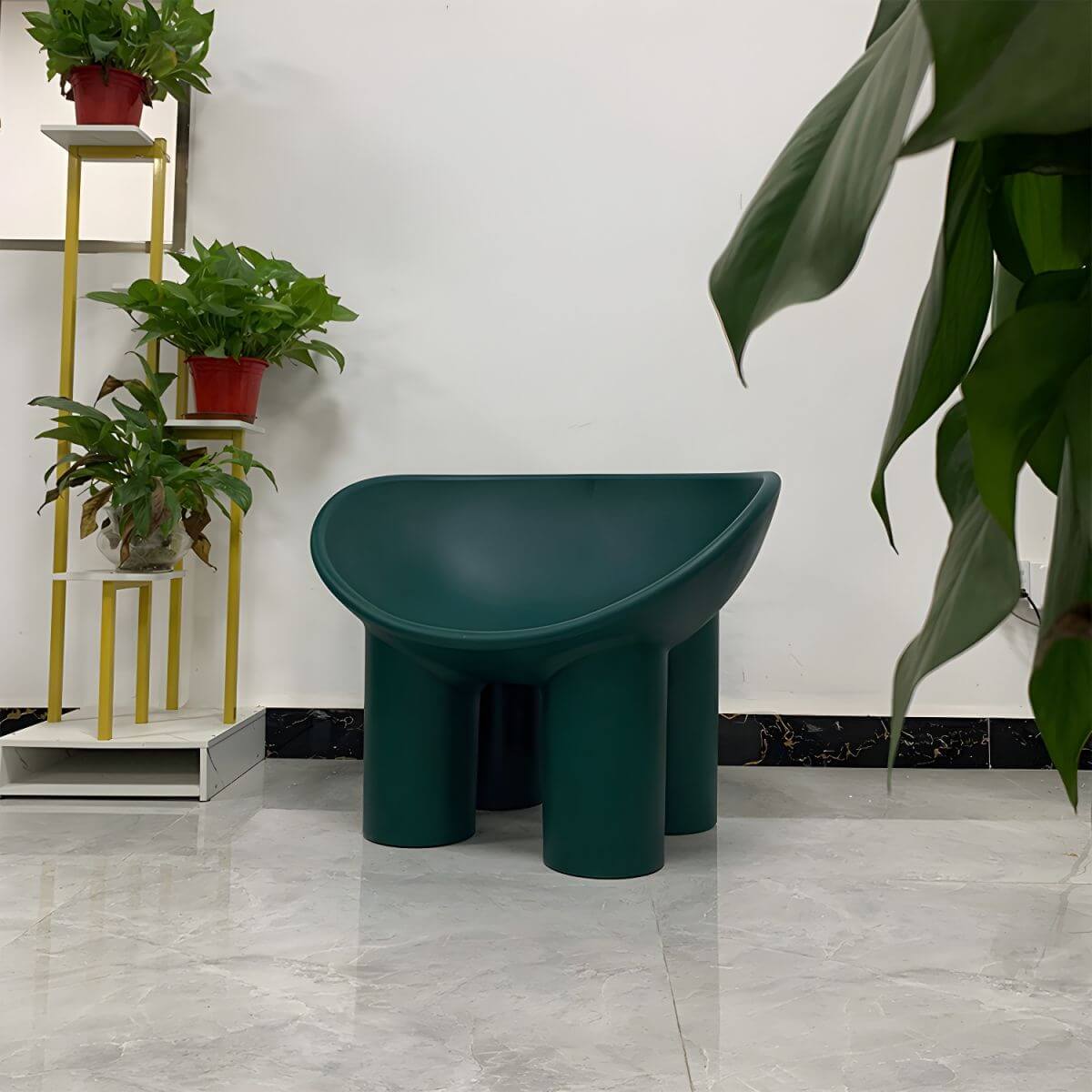 Modern armless papasan accent chair with bowl shape and elephant legs