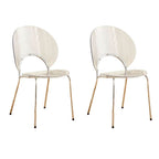 Stackable Scandinavian style dining chair with plastic seat, acrylic back, and silver legs