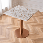 Modern marble table with sturdy metal base, perfect for adding a timeless aesthetic to any space