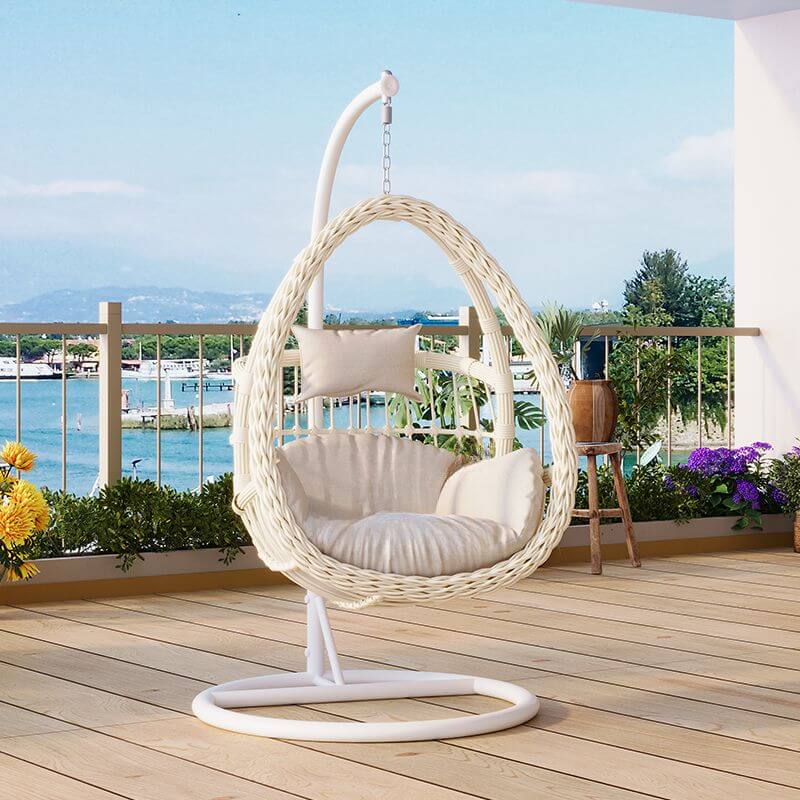 Pink metal 2-seater porch swing with stand, chain, and cushions for outdoor seating